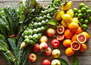 a group of fruits and vegetables on a wood surface Healthy Weight Loss Diets Northfield